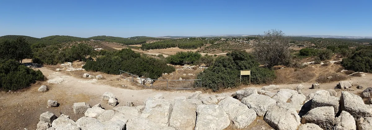 Panorama from the ruins of Horvat Midras over wooded hills and fields in the Adulam area